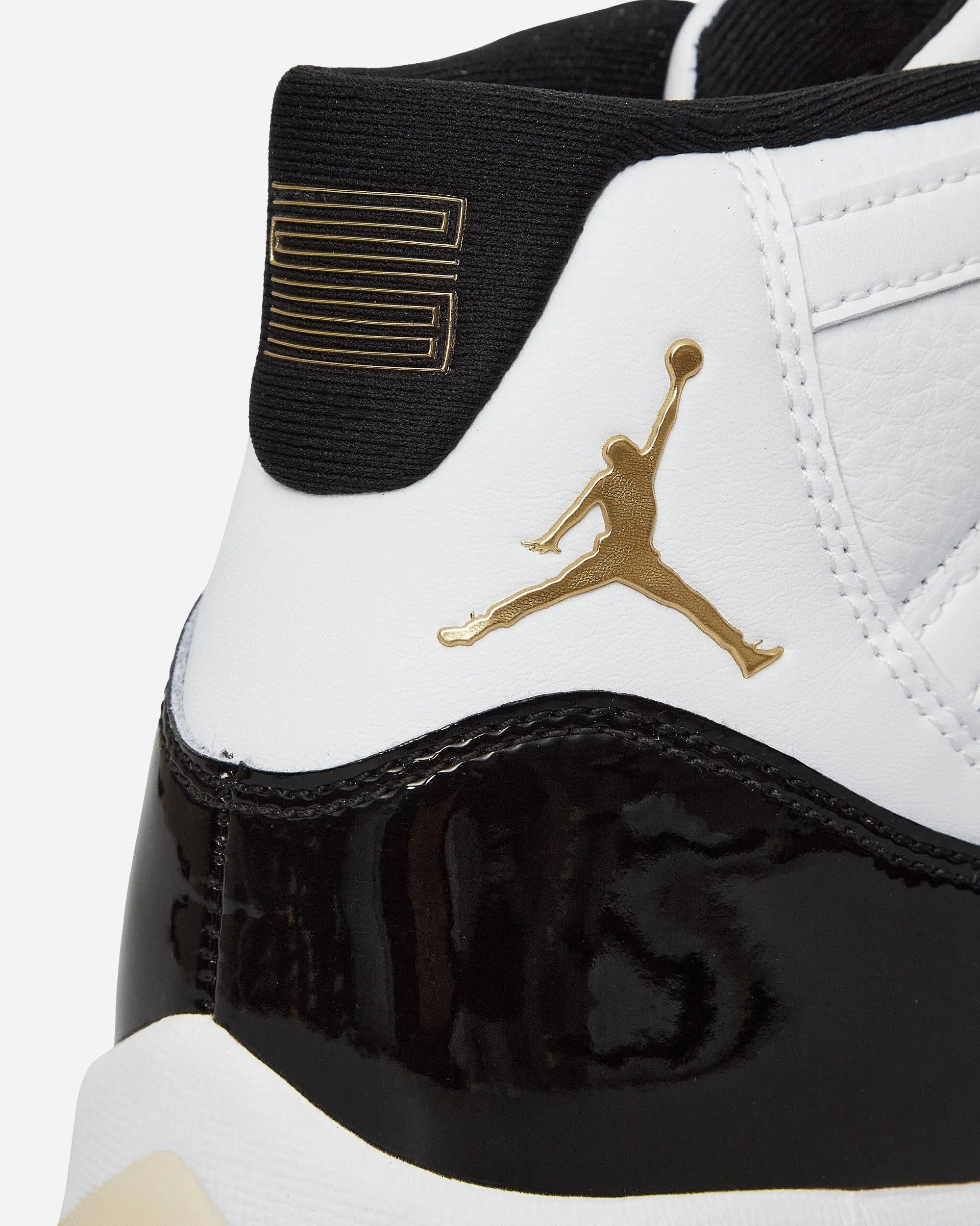Air Jordan 11 Retro Sneakers  White / Metallic Gold / Black